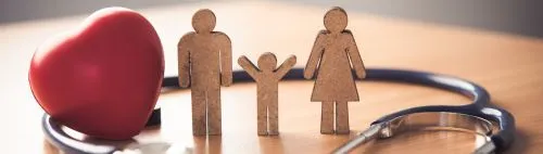 human figures next to a heart and doctors tool, symbolizing a healthy family.
